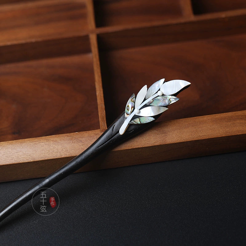 Feathered Clouds Ebony Hair Stick with Natural Shell Leaf Design