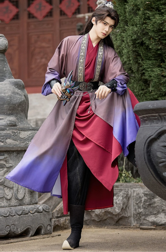 Person in traditional attire standing in a historical or cultural setting