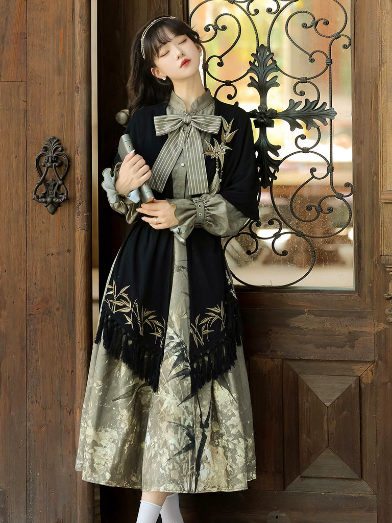 Woman in a traditional outfit standing in front of a decorative wooden door.