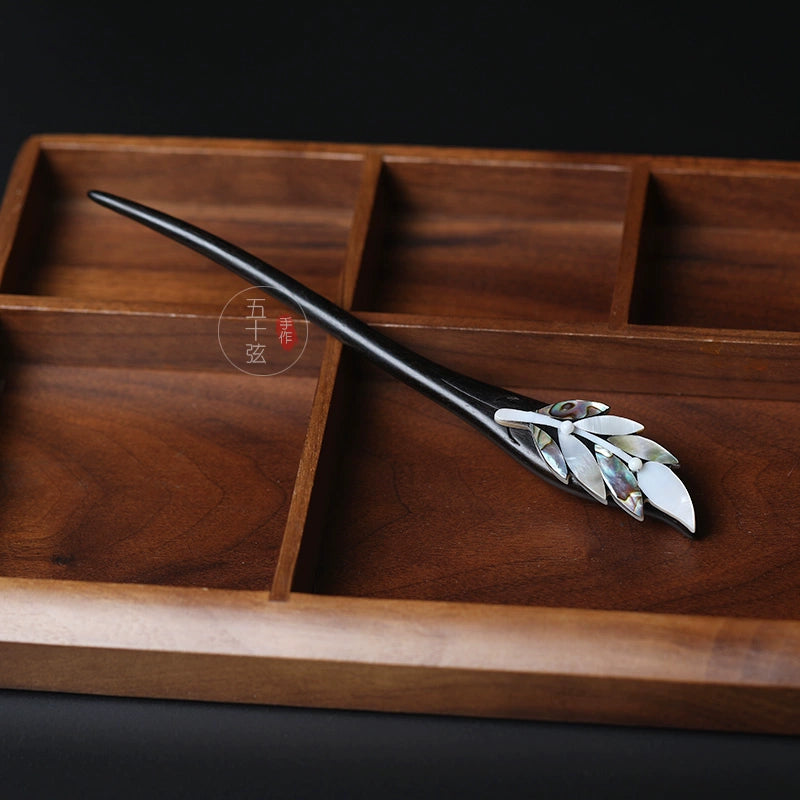 Feathered Clouds Ebony Hair Stick with Natural Shell Leaf Design