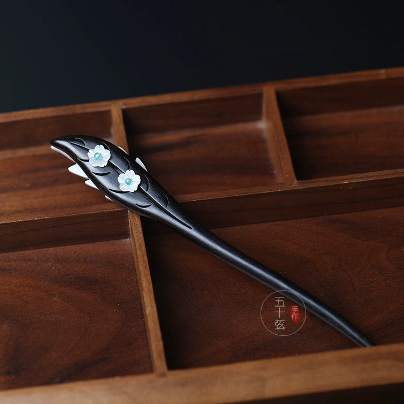 Feathered Clouds Ebony Hair Stick with Natural Shell Leaf Design