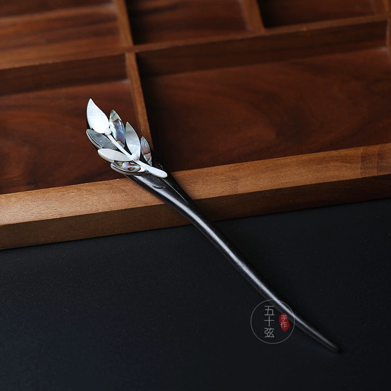 Feathered Clouds Ebony Hair Stick with Natural Shell Leaf Design
